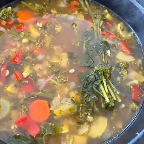 Lemon-Herb Garden Market Day Soup simmering in broth with fresh herbs