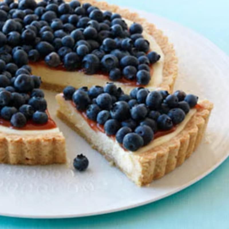 Blueberry Lemon Cheese Tart with fresh blueberries on top for the June 30 Summer Bites class.