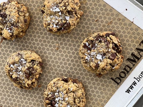 Close-up of chocolate oatmeal cookies baked on bonMAT, perfect for easy Thanksgiving desserts