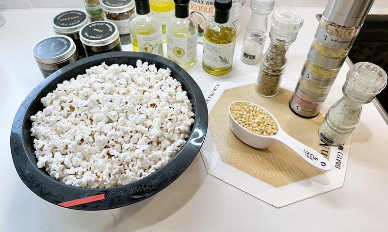 A gourmet popcorn bar set up in your kitchen for everyone to enjoy!